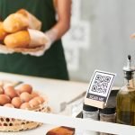 QR code for online payments on street food cart and vendor with