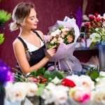 florist-woman-creates-flower-bouquet-of-mixed-flow