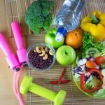 Healthy eating of ketogenic diet meal plan with Workout and fitness dieting ,fitness and weight loss concept, fruit, Vegetable and orange juice,salad,top view on wooden background, Food and health.